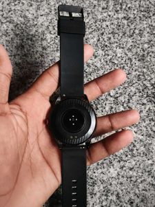 Sleek Black Smartwatch With Usb Charge Cable