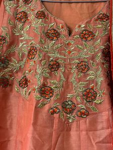 Elegant Orange Kurta Set with Embroidered Details