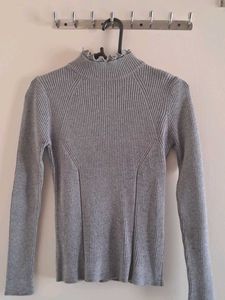 A Grey Turtleneck Top