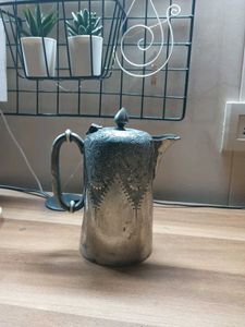 silver-plated pitcher or teapot