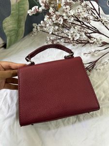 Maroon handbag