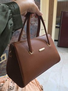 Brown Leather Dotted Sling Bag