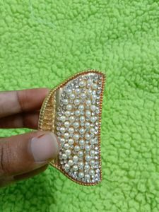 stone and beads clutcher
