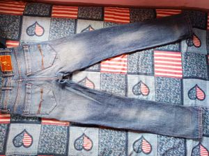 Distressed Wash Denim Jeans