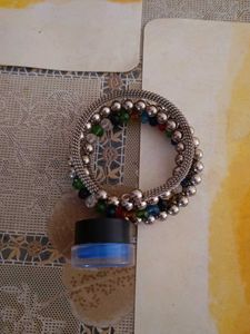 Silver Beaded Bracelet Set and a blue gel eyeliner
