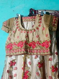 Beautiful golden and pink colour lahenga