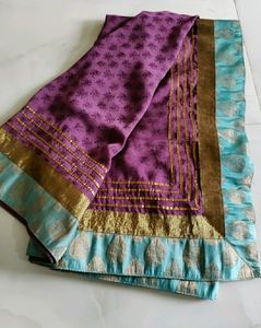Good condition Saree , Slightly Feaded Border