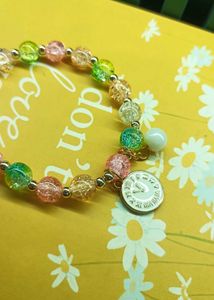 Beaded multicolour clock charm bracelet
