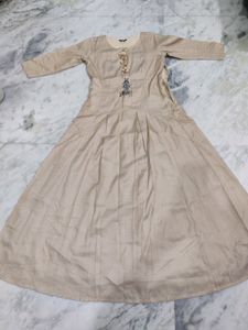cream gown with mint green jacket