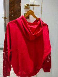 Red Sweatshirt With Attached Earphones