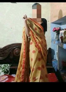 Elegant Beige Saree with Red Accents