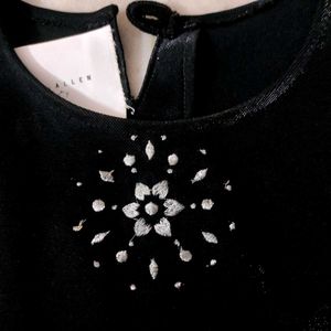 Black Sleeveless Top with Rhinestone Detail