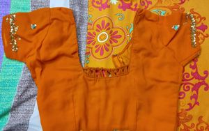 embroidered heavy orange saree