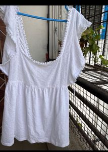 Branded White top