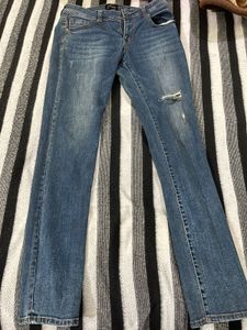 Distressed Denim Jeans