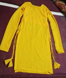 Yellow Kurti With Churidar Sleeves
