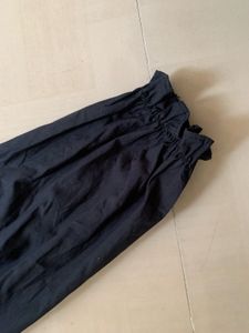 Avant-Garde Black Dress with White Collar