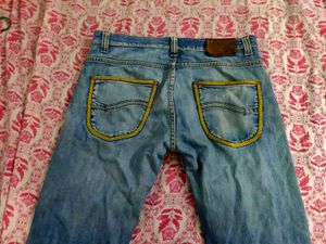 Distressed Denim Jeans