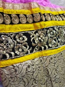 A Braco Net Gown It Comes With Yellow Duppatta