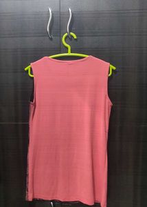 pink and black sleeveless top