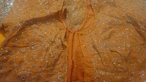 Embroidered Orange Saree And Blouse