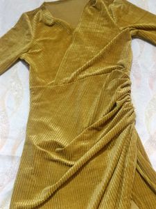 Turn Heads in Our Mustard Velvet Bodycon Dress.