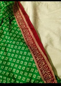 Elegant Green Saree with Flower Design