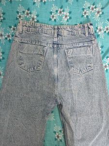 High-Waisted Denim Jeans with Daisy Embroidery.