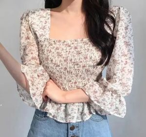 white floral peplum top