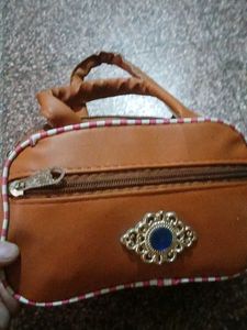 Brown Handbag with Blue Stone
