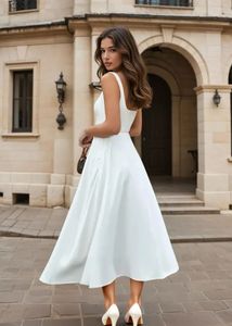 Newme white solid fit flare dress 👗
