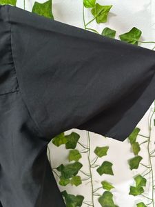 Black button up shirt