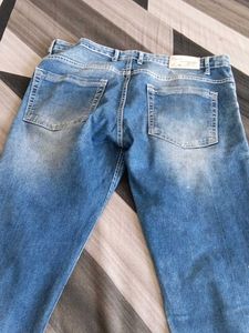 Ripped Blue Denim Jeans