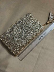 Sequence Golden Clutch