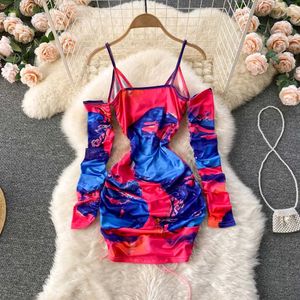 vibrant ruched bodycon dress with a tie-dye print