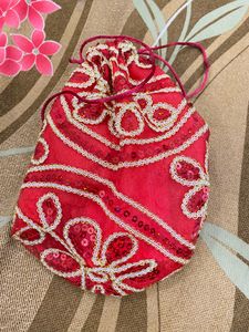 Red Potli With Sequence Work