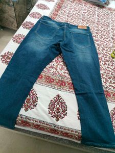 Ripped Blue Denim Jeans
