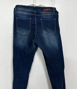 Ripped Dark Wash Denim Jeans