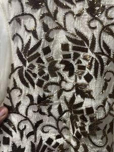 cream full hand work Chaniya choli wid net dupatta