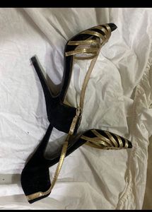 Black Heel With Gold Straps