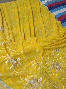 Yellow Saree with beautiful Flowers