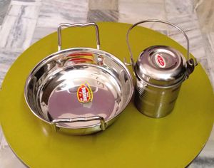 Combo of steel kadhai and milk container.
