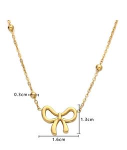 Gold Bow Pendant Necklace