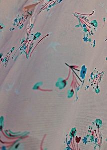 It has a very lovely design,  baby pink