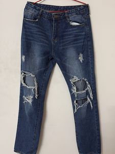 Ripped Blue Denim Jeans
