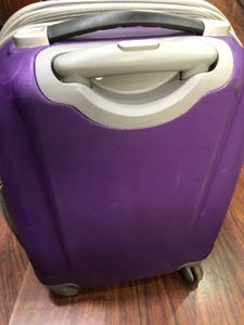 Purple Travelworld Rolling Suitcase