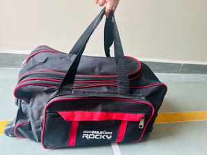 Ranjit Rocky Black &amp; Red Duffle Bag With Wheels
