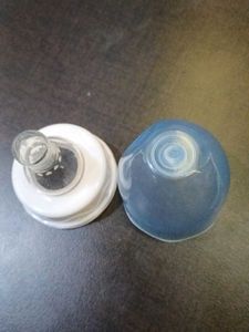 Nipples &amp; Caps Of Feeding Bottles