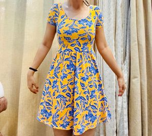 Forever 21. Floral Yellow Back Criss Cross  Dress