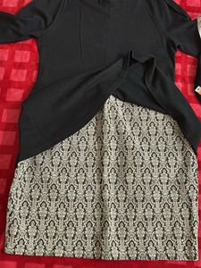 Black Peplum Top with Patterned Skirt